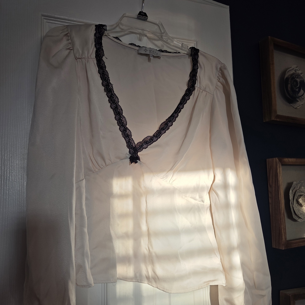Elegant Cream Blouse with Black Lace Trim
